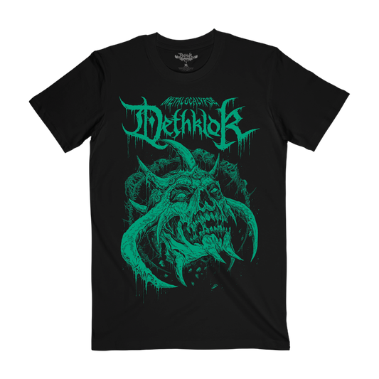 Black T-shirt featuring a ghoulish green skull with twisted tusks and drippy "Dethklok" lettering.