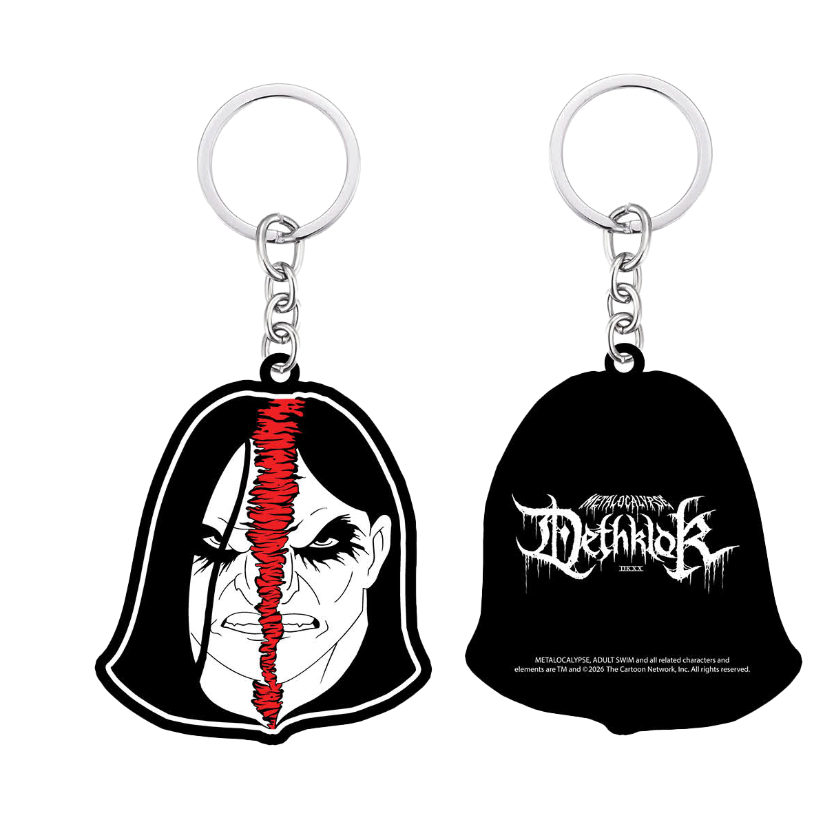 Keychain with a face design and black bell-shaped keychain with text on a white background